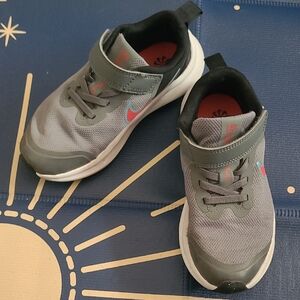 Nike Kids Gray Sneakers with Red Swoosh